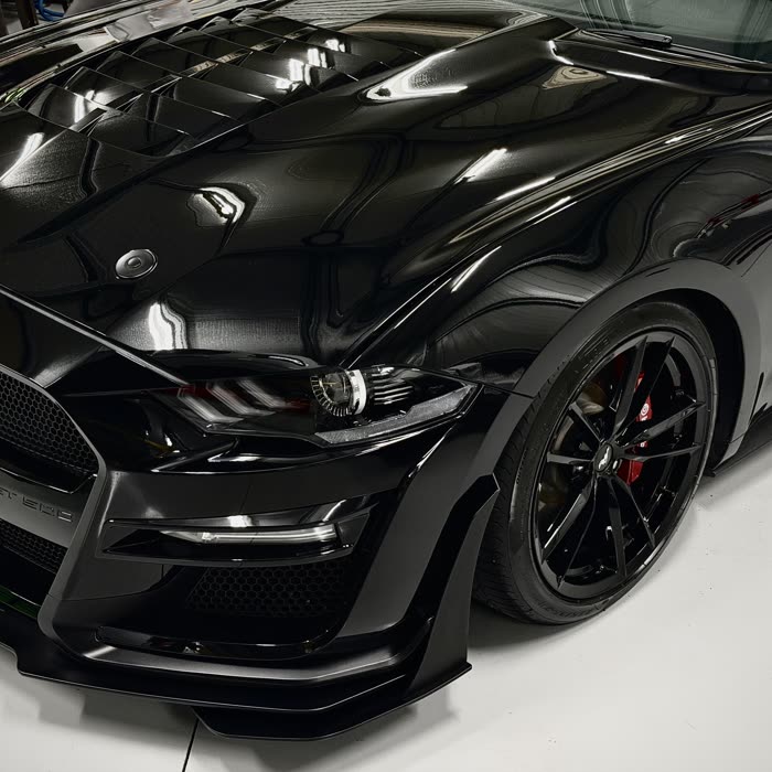 Gloss black Shelby GT500 bonnet, headlight and wheel after a Signature Exterior detail